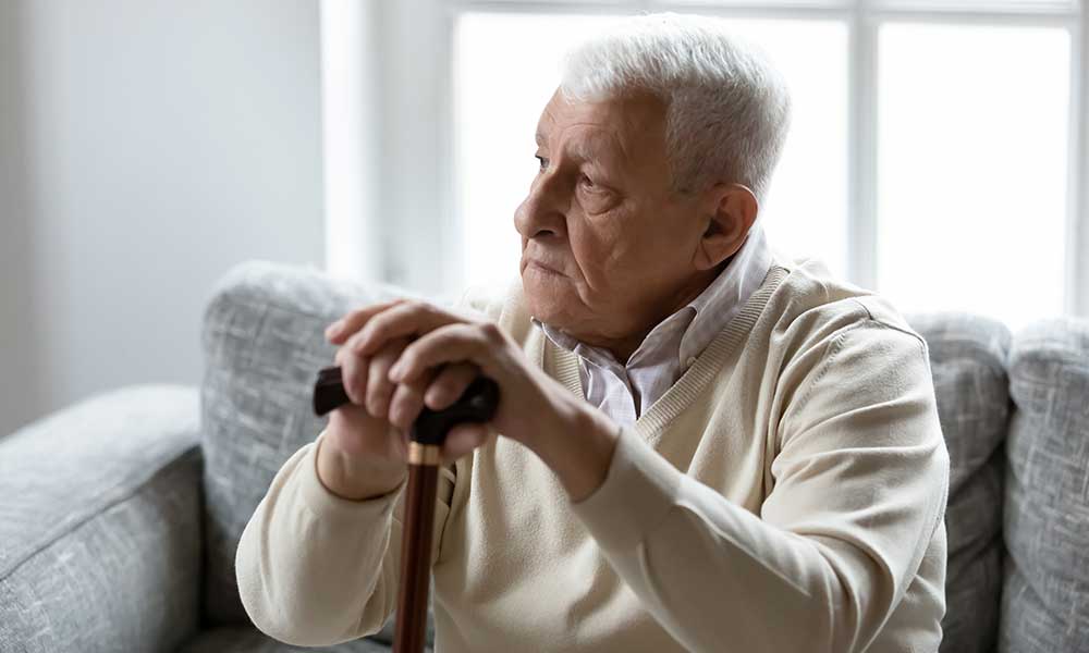 Elderly man who looks exhausted